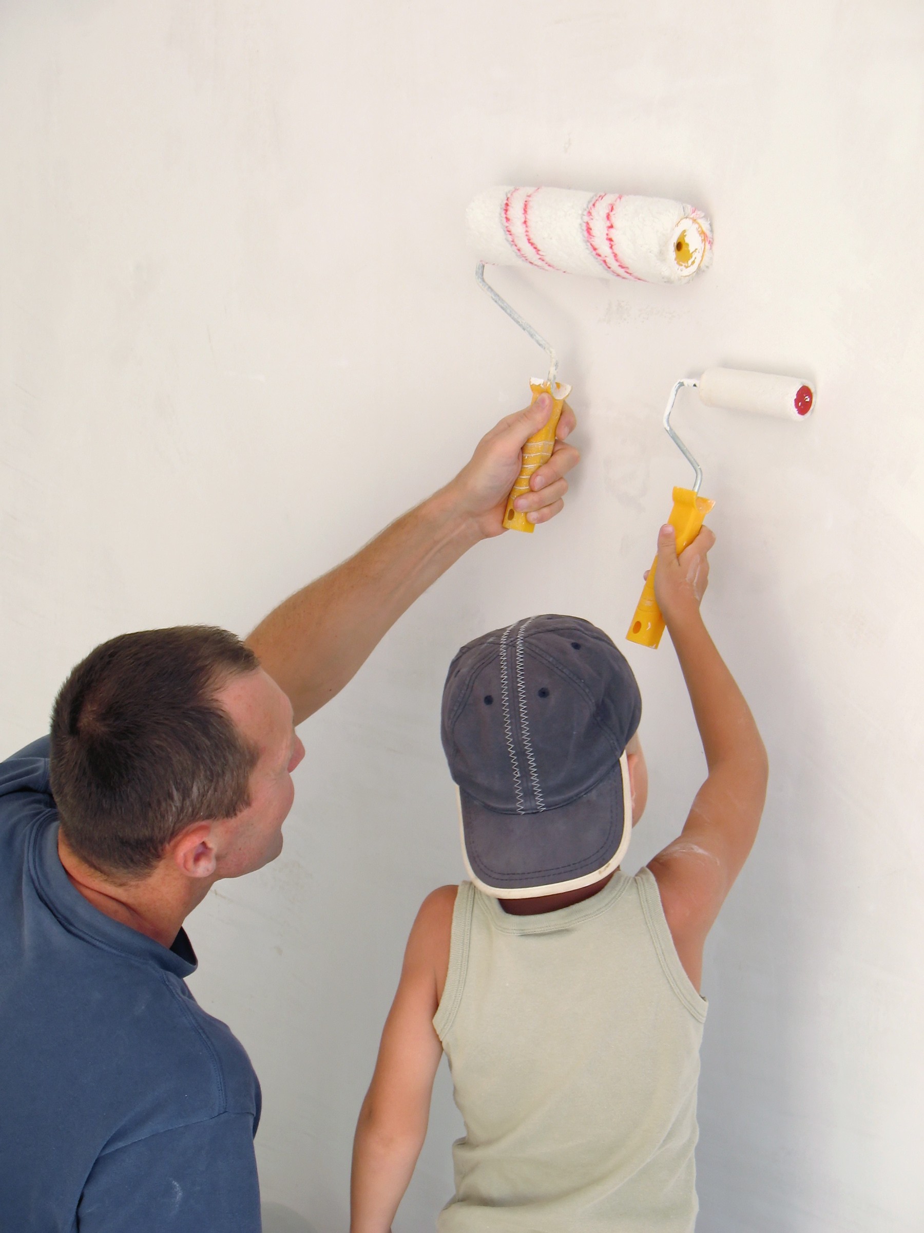 bigstock child and father painting wall 12117317