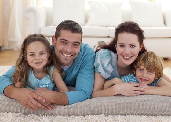 1 bigstock Family On Floor In Living room 6143968 1